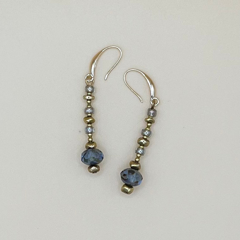 May & Moon Everything Earrings in slate blue fire-polished Czech glass with gold accents and sterling silver ear wires — handmade, lightweight, and refined.