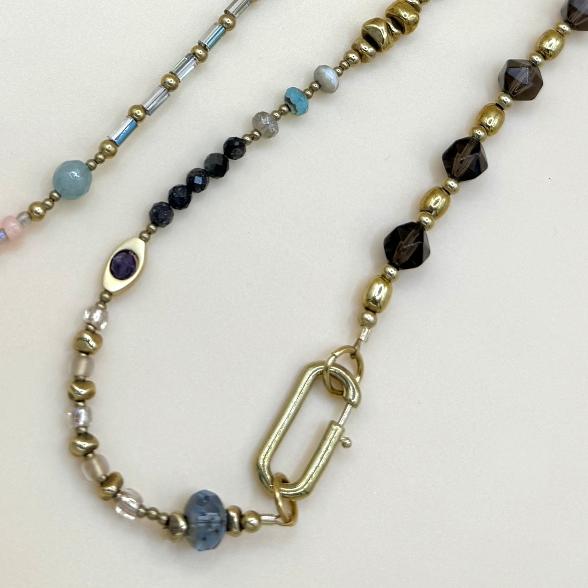 Handmade boho smoky gemstone beaded necklace featuring gold hardware, layered natural stones, and artisan minimalist design by May & Moon