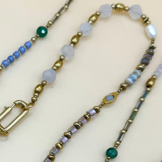 Handcrafted boho beaded necklace with delicate gemstones, gold accents, and minimalist layering design by May & Moon